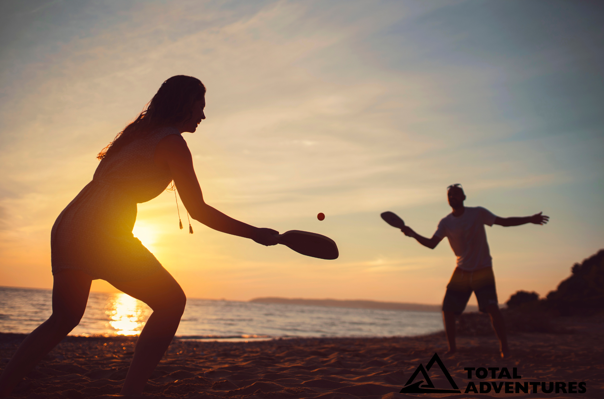 Beach Games and Sun Setting